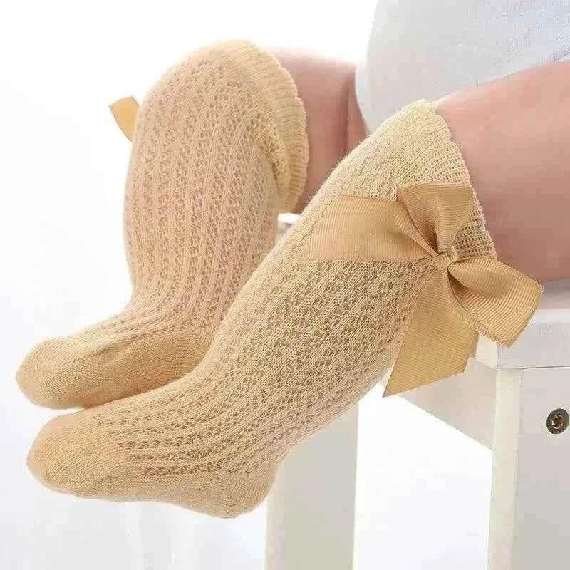 Baby Girls Long Bow Socks - Stylish and Comfortable Footwear for Little Fashionistas.