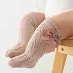 Baby Girls Long Bow Socks - Stylish and Comfortable Footwear for Little Fashionistas.