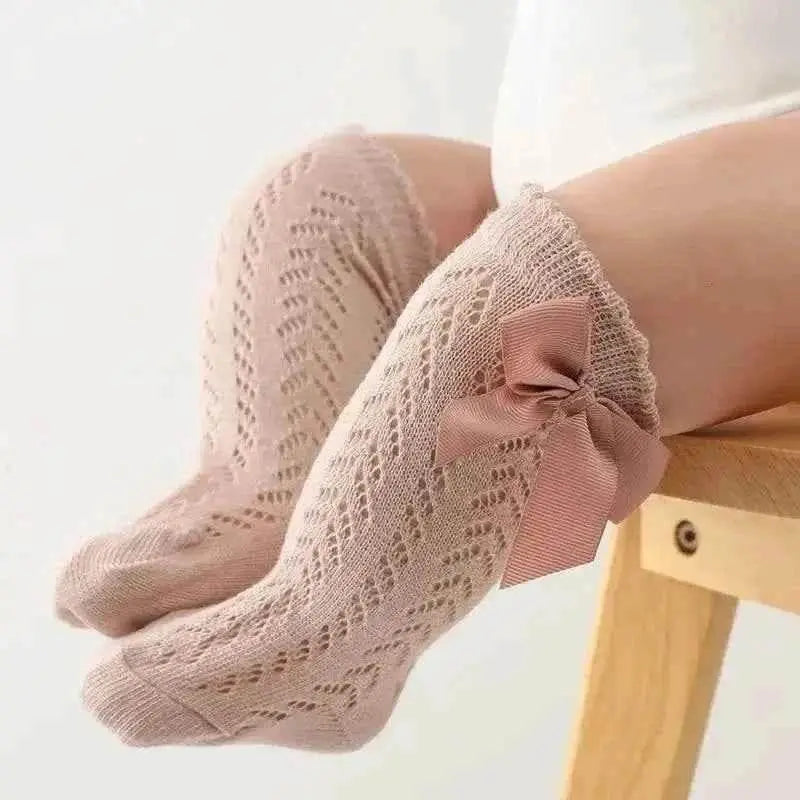 Baby Girls Long Bow Socks - Stylish and Comfortable Footwear for Little Fashionistas.