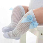 Baby Girls Long Bow Socks - Stylish and Comfortable Footwear for Little Fashionistas.