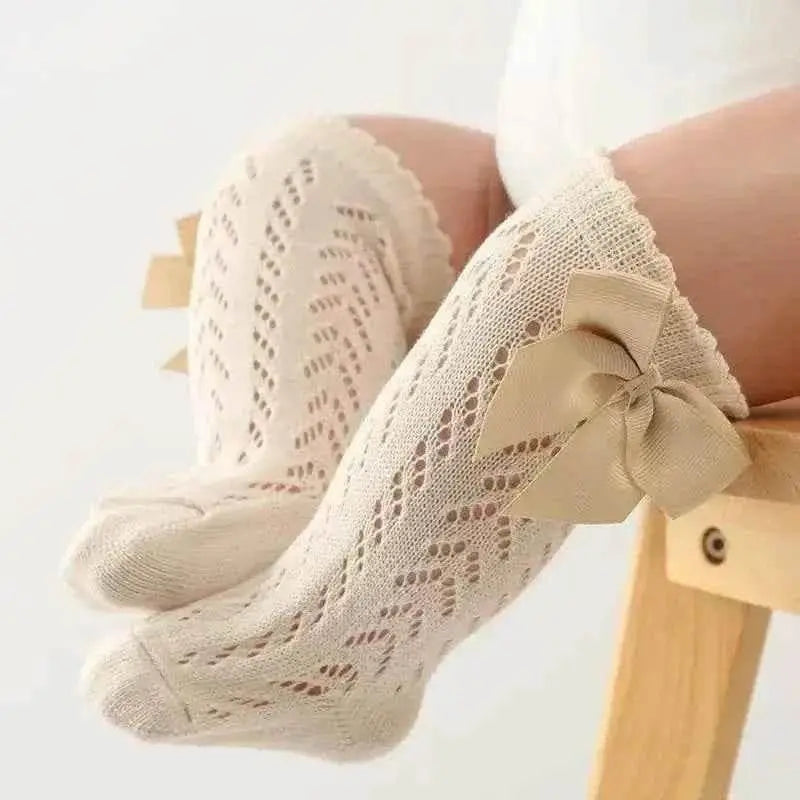 Baby Girls Long Bow Socks - Stylish and Comfortable Footwear for Little Fashionistas.