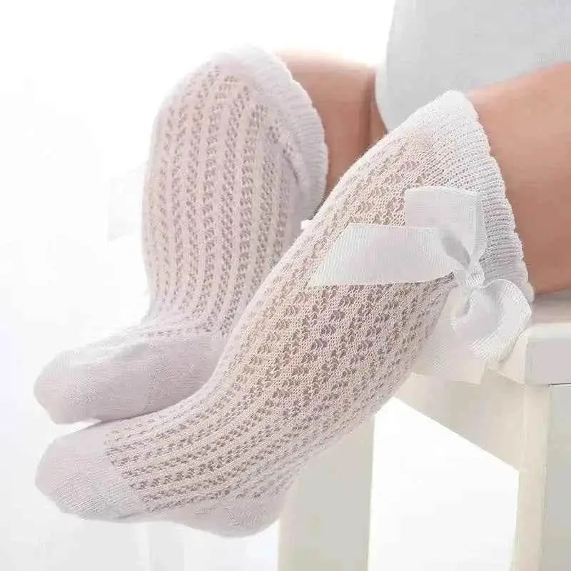 Baby Girls Long Bow Socks - Stylish and Comfortable Footwear for Little Fashionistas.