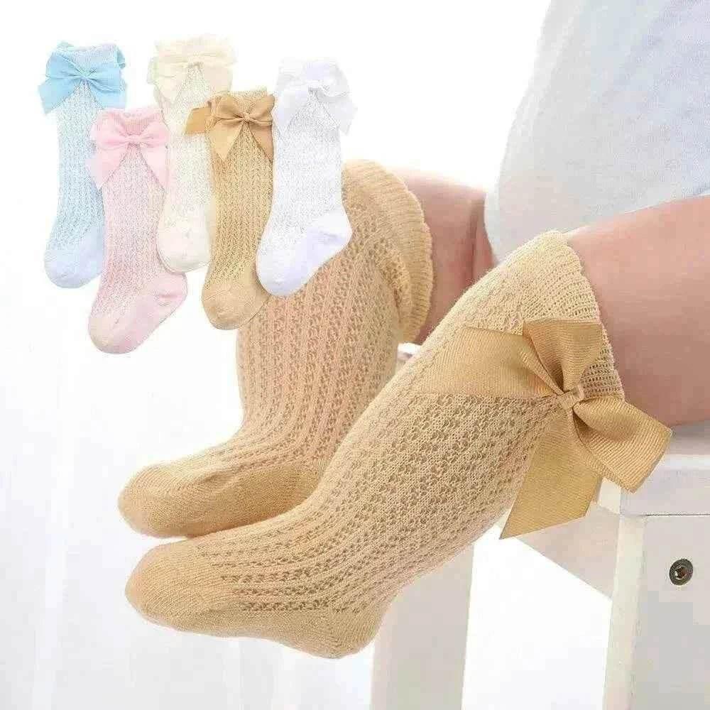 Baby Girls Long Bow Socks - Stylish and Comfortable Footwear for Little Fashionistas.
