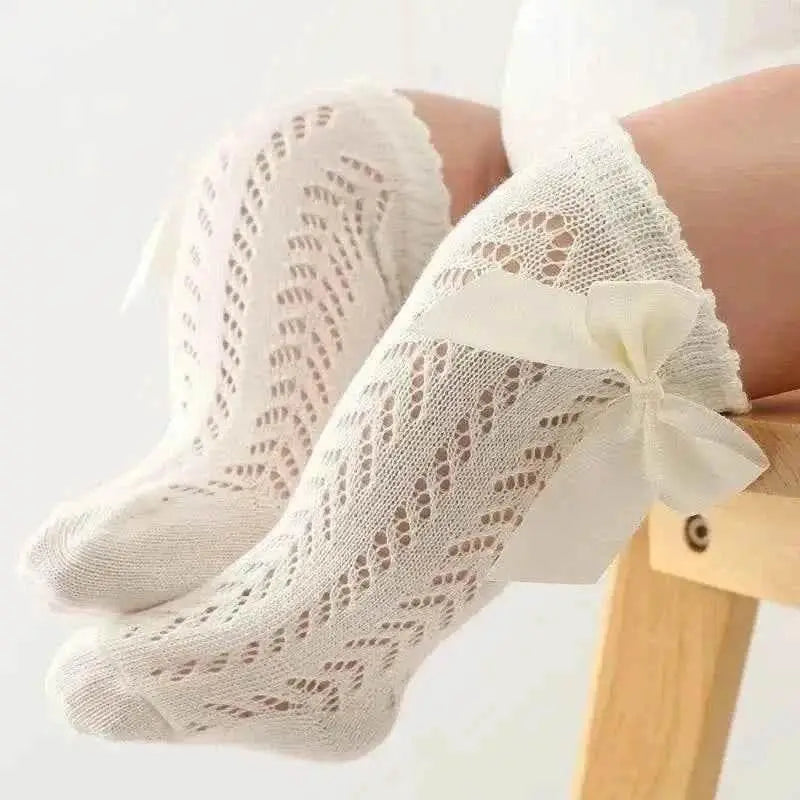 Baby Girls Long Bow Socks - Stylish and Comfortable Footwear for Little Fashionistas.