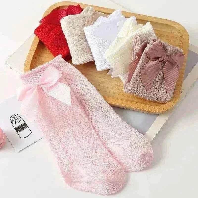 Baby Girls Long Bow Socks - Stylish and Comfortable Footwear for Little Fashionistas.