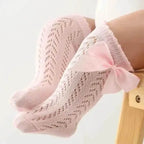 Baby Girls Long Bow Socks - Stylish and Comfortable Footwear for Little Fashionistas.