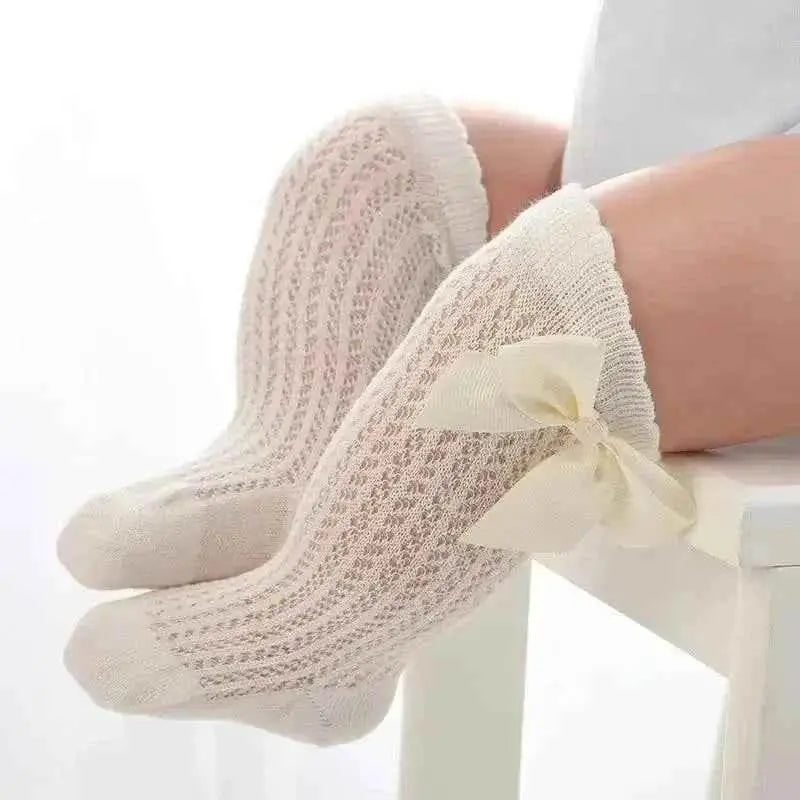 Baby Girls Long Bow Socks - Stylish and Comfortable Footwear for Little Fashionistas.