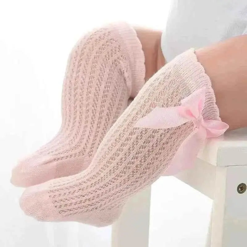 Baby Girls Long Bow Socks - Stylish and Comfortable Footwear for Little Fashionistas.