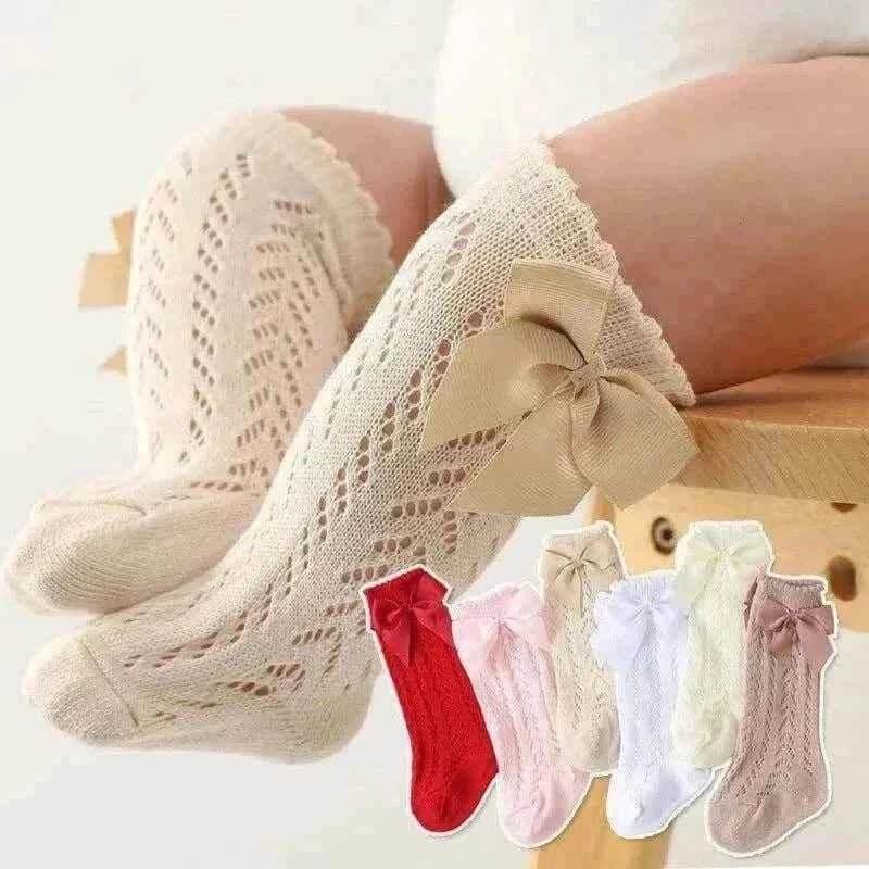 Baby Girls Long Bow Socks - Stylish and Comfortable Footwear for Little Fashionistas.