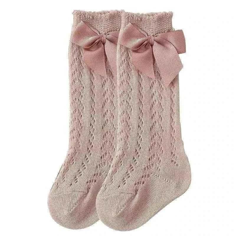 Baby Girls Long Bow Socks - Stylish and Comfortable Footwear for Little Fashionistas.