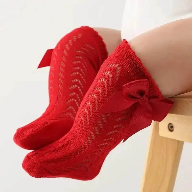 Baby Girls Long Bow Socks - Stylish and Comfortable Footwear for Little Fashionistas.
